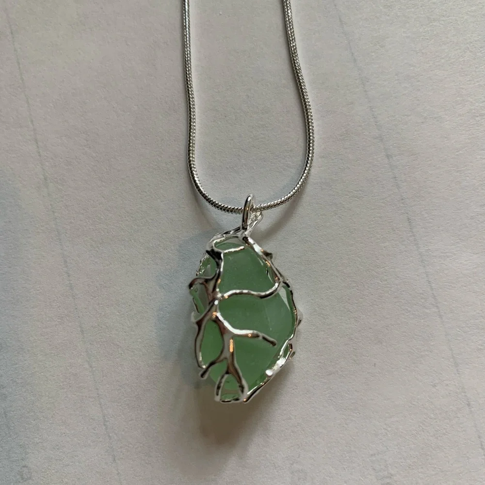 Genuine Caribbean Sea Glass Wrapped in Nature-Inspired Silver Plated Cage